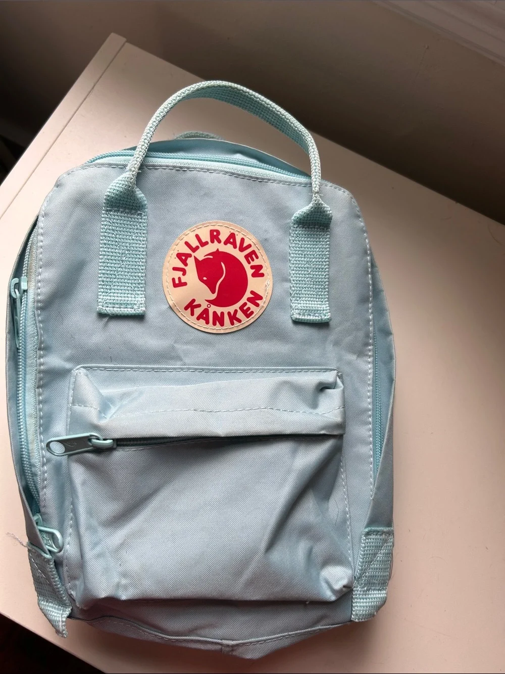 Fjallraven Kånken Mini Backpack in Light Blue with Red Logo